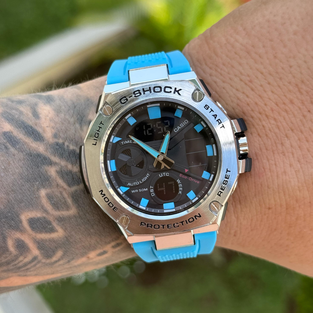 143 G shock Metalico correa azul claro